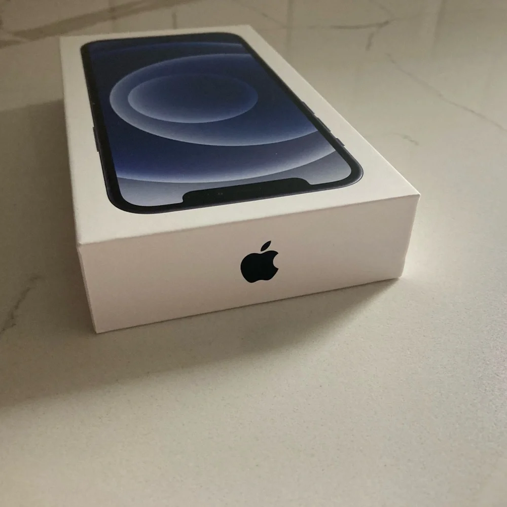Apple iPhone 12 black 64GB product box and instructions